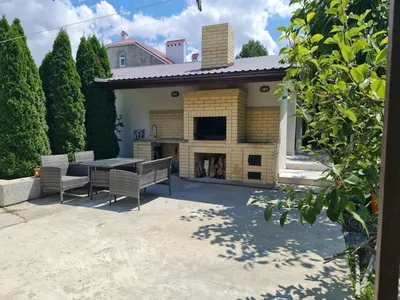 Апартаменты с кухней и террасой с видом на сад. — sm.webp