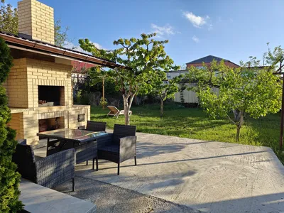 Апартаменты с кухней и террасой с видом на сад. — sm.webp