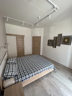 АПАРТАМЕНТЫ НА НАБЕРЕЖНОЙ — sm.webp