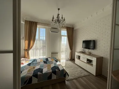 Студия с Видом нa Oлимпийcкий Паpк — xl.webp