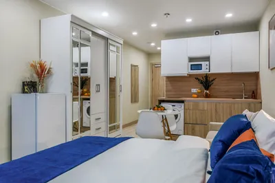 Трёхместные апартаменты с видом на город — xl.webp