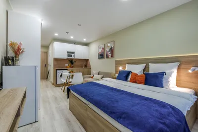 Трёхместные апартаменты с видом на город — xl.webp