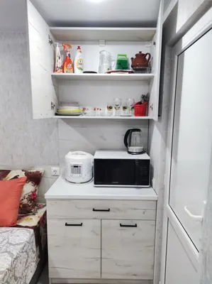 комната в  коттедже с кухонной зоной — sm.webp